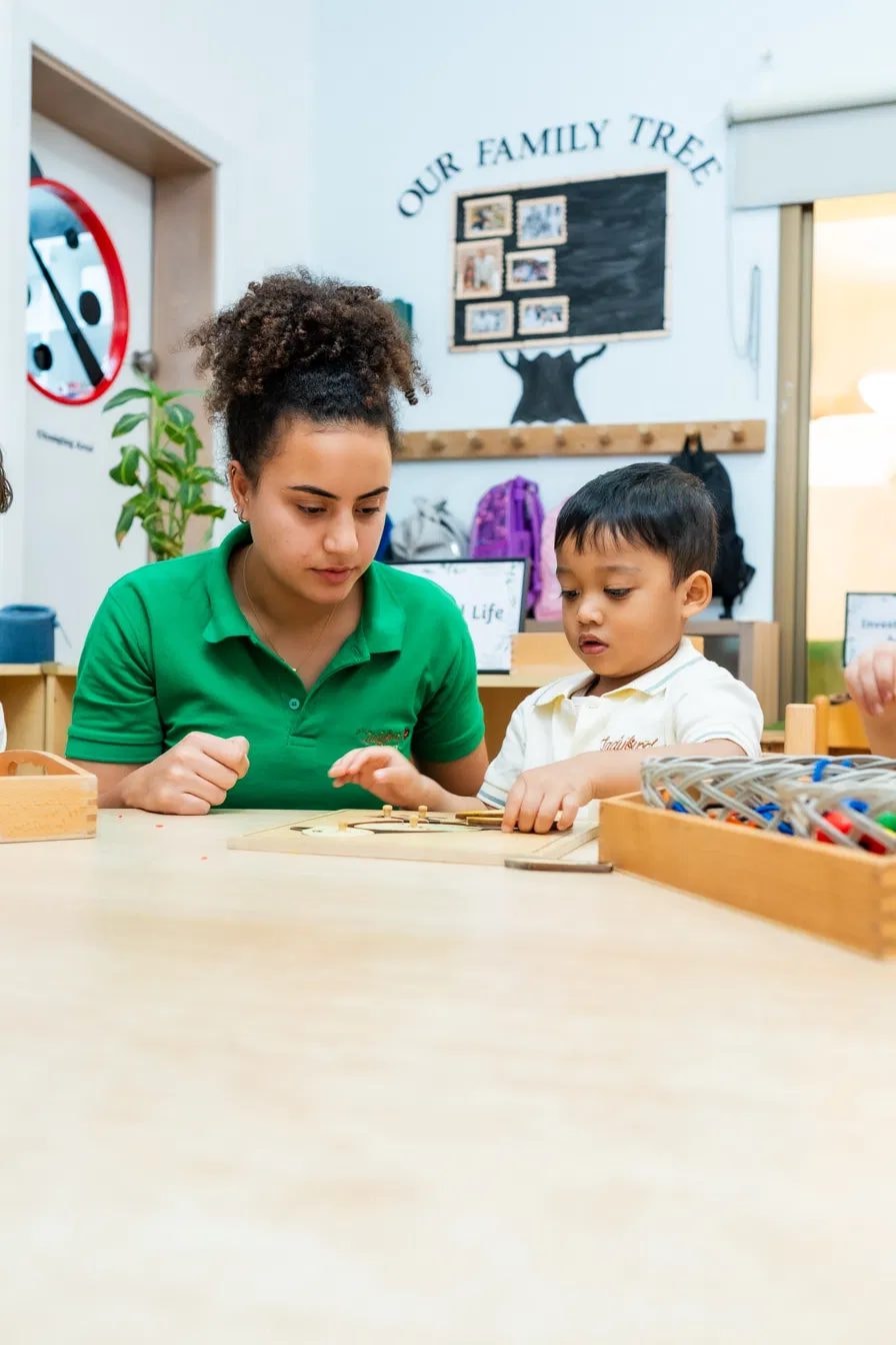 Ladybird Nursery Director with a child in the classroom