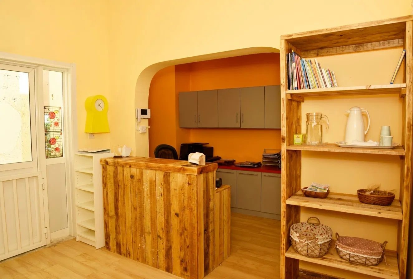 Warm wooden reception area at Ladybird Nursery